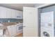 Convenient laundry closet with full-size washer and dryer at 300 N Ocean Blvd. # 1628, North Myrtle Beach, SC 29582