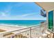 Stunning ocean view from a condo balcony, with two chairs to enjoy the vista at 300 N Ocean Blvd. # 1628, North Myrtle Beach, SC 29582