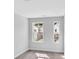 Bright bedroom with two windows and neutral walls at 310 Sandridgebury Dr. # 40, Little River, SC 29566