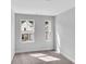 Bright bedroom with two windows and neutral walls at 310 Sandridgebury Dr. # 40, Little River, SC 29566