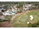 Aerial view of house and surrounding golf course community at 3100 Lahinch Dr., Myrtle Beach, SC 29579