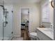 Clean bathroom with a walk-in shower and white cabinets at 33 Kings Ct., Myrtle Beach, SC 29572