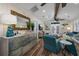 Living room with hardwood floors, vaulted ceiling, and built-in shelving at 33 Kings Ct., Myrtle Beach, SC 29572