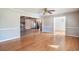 Bright living room with hardwood floors and views into kitchen and dining areas at 407 Walnut Ave., Georgetown, SC 29440