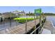 Wooden dock with dolphin tour sign and boat at 4343 Baldwin Ave. # 4343, Little River, SC 29566