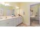 Bathroom with double vanity and access to the tub and shower at 44 Hamby Dr., Pawleys Island, SC 29585