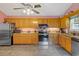 Kitchen features granite countertops and oak cabinets at 4490 Bradford Circle, Myrtle Beach, SC 29588