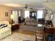 Spacious living room with striped couch and wood floors at 502 Helena St., Georgetown, SC 29440