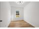 Simple bedroom with wood flooring and a window at 534 War Eagle Ct., Conway, SC 29526