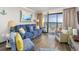 Living room with ocean view, comfy seating, and hardwood floors at 6900 N Ocean Blvd. # 1540, Myrtle Beach, SC 29572