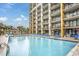 Resort-style pool with plenty of lounge chairs at 6900 N Ocean Blvd. # 1540, Myrtle Beach, SC 29572