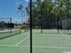 Community tennis courts with enclosed fencing at 734 Macon Alley, Myrtle Beach, SC 29588