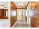 Interior entryway with wood-paneled walls and tile flooring at 827 Brenda Pl., Myrtle Beach, SC 29577