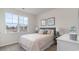 Bedroom with a gray headboard bed and neutral decor at 901 Farmers Passage Loop, Loris, SC 29569