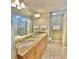 Bathroom with double sinks, granite countertops, and shower at 9994 Beach Club Dr. # 1806, Myrtle Beach, SC 29572