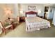 Bedroom with a queen bed and small sitting area at 9994 Beach Club Dr. # 1806, Myrtle Beach, SC 29572