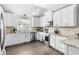 Modern kitchen with stainless steel appliances and granite countertops at 160 Shipmaster Ave., Pawleys Island, SC 29585