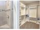 Large walk-in closet and bathroom with shower at 208 Angel Wing Dr., Myrtle Beach, SC 29588