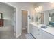 Double vanity bathroom with a toilet and linen closet at 208 Angel Wing Dr., Myrtle Beach, SC 29588
