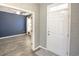 Welcoming entryway with view into a navy-walled room at 208 Angel Wing Dr., Myrtle Beach, SC 29588
