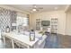 Living room with sectional sofa and built-in shelving at 208 Angel Wing Dr., Myrtle Beach, SC 29588
