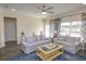 Living room with light gray sofas and a pale yellow coffee table at 208 Angel Wing Dr., Myrtle Beach, SC 29588