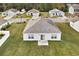 Back of house showing a patio and grassy backyard at 3151 Holly Loop, Conway, SC 29527