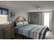 Bedroom with a comfortable bed and beachy decor at 6001-1774 S Kings Hwy., Myrtle Beach, SC 29575