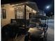 Night view of home with golf cart at 6001-1774 S Kings Hwy., Myrtle Beach, SC 29575