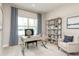 Home office with built in shelving, neutral decor, and large window at 7071 Denim Loop, Myrtle Beach, SC 29575