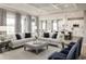 Open concept living room and kitchen with neutral decor and hardwood floors at 7071 Denim Loop, Myrtle Beach, SC 29575