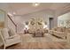 Bright living room featuring a neutral color palette, hardwood floors, and comfortable seating at 735 Isle Verde Dr, Myrtle Beach, SC 29579