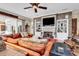 Comfortable living room featuring a fireplace and built-in shelving at 8578 San Marcello Dr. # 101, Myrtle Beach, SC 29579