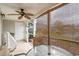 Relaxing screened porch with lake view and ceiling fan at 1024 Palisade Circle # 1024, Myrtle Beach, SC 29577