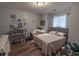 Bright bedroom with wood floors, a double bed, and a desk at 1264 Brighton Ave., Myrtle Beach, SC 29588