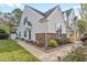 Side view of a charming townhome with well-maintained landscaping at 140 Wimbledon Way # 140, Murrells Inlet, SC 29576