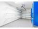 Garage with epoxy flooring, shelving, and storage cabinets at 140 Wimbledon Way # 140, Murrells Inlet, SC 29576