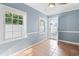 Sunroom with tile flooring and access to backyard at 140 Wimbledon Way # 140, Murrells Inlet, SC 29576
