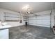 Garage with overhead storage and concrete floor at 142 Rybolt Rd., Pawleys Island, SC 29585