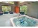 Inviting hot tub with blue lighting and seating area at 142 Rybolt Rd., Pawleys Island, SC 29585