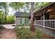 Exterior view of a house with a walkway and porch at 142 Rybolt Rd., Pawleys Island, SC 29585