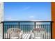 Balcony with ocean view and seating for two at 1501 S Ocean Blvd. # 1541, Myrtle Beach, SC 29577