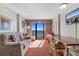 Bright living room with ocean views and comfortable seating at 1501 S Ocean Blvd. # 1541, Myrtle Beach, SC 29577