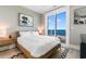 Bedroom with ocean view and sliding glass door to balcony at 219 South Seaside Dr., Surfside Beach, SC 29575