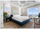 Main bedroom with ocean view and blue upholstered bed at 219 South Seaside Dr., Surfside Beach, SC 29575