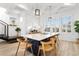 Kitchen island with seating, white cabinets, and ocean view at 219 South Seaside Dr., Surfside Beach, SC 29575