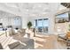 Bright living room with ocean view, comfortable seating, and fireplace at 219 South Seaside Dr., Surfside Beach, SC 29575