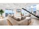 Ocean-view living room with comfy sectional sofa and stylish decor at 219 South Seaside Dr., Surfside Beach, SC 29575