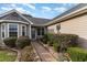 House entry with walkway and landscaping at 235 Bittersweet Ln., Myrtle Beach, SC 29579