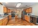 Kitchen boasts stainless steel appliances and wood flooring at 235 Bittersweet Ln., Myrtle Beach, SC 29579